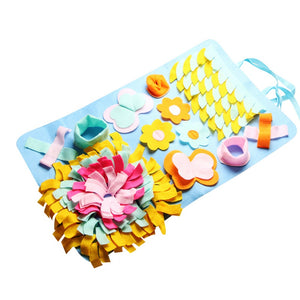 This snuffle mat for dog's is sky blue, with butterflies, and flowers. 